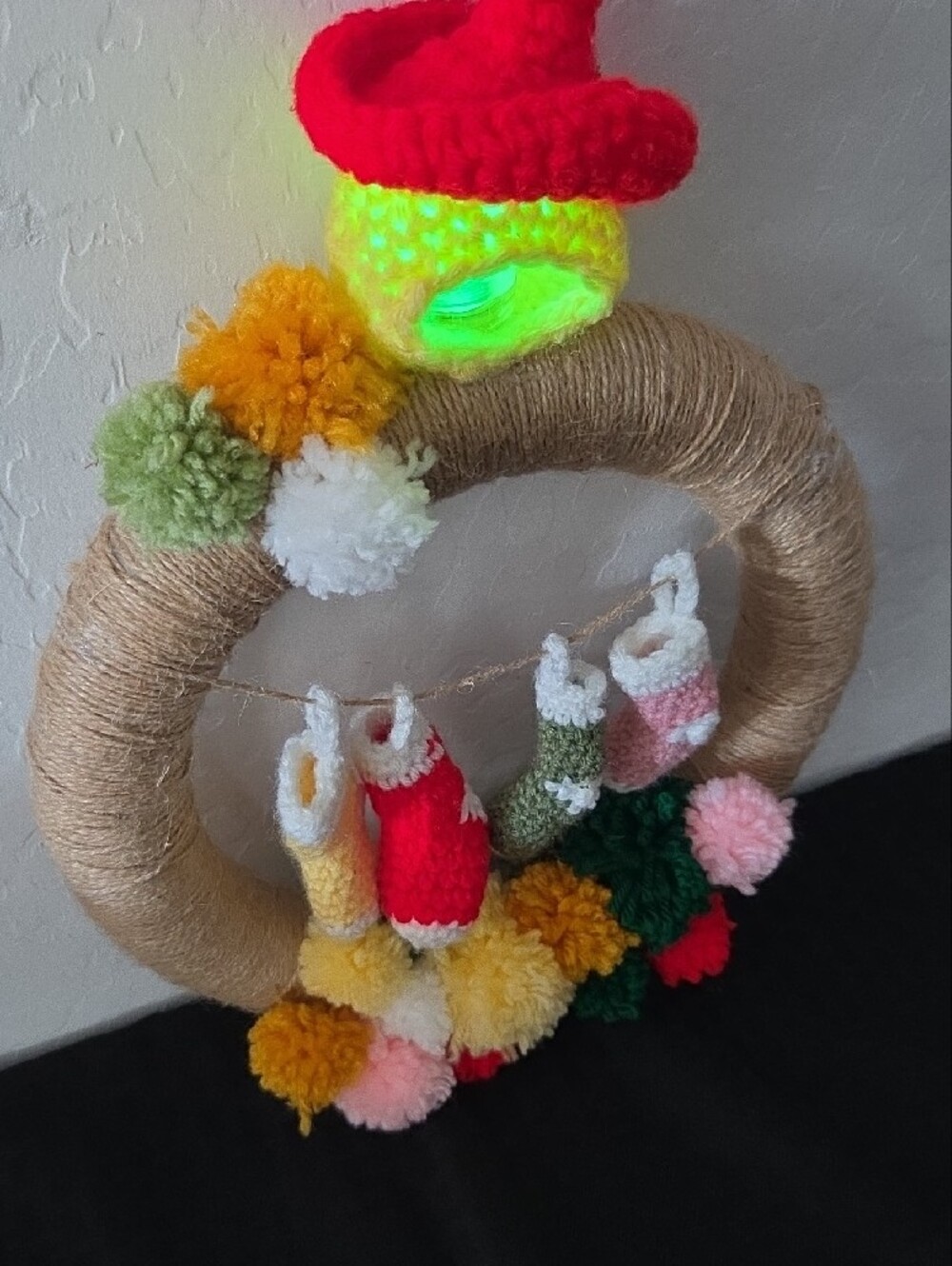 Handcrafted 10in Pom-Pom Wreath with Mini Stockings - Red, Green, Yellow, Pink - Picture 2 of 3